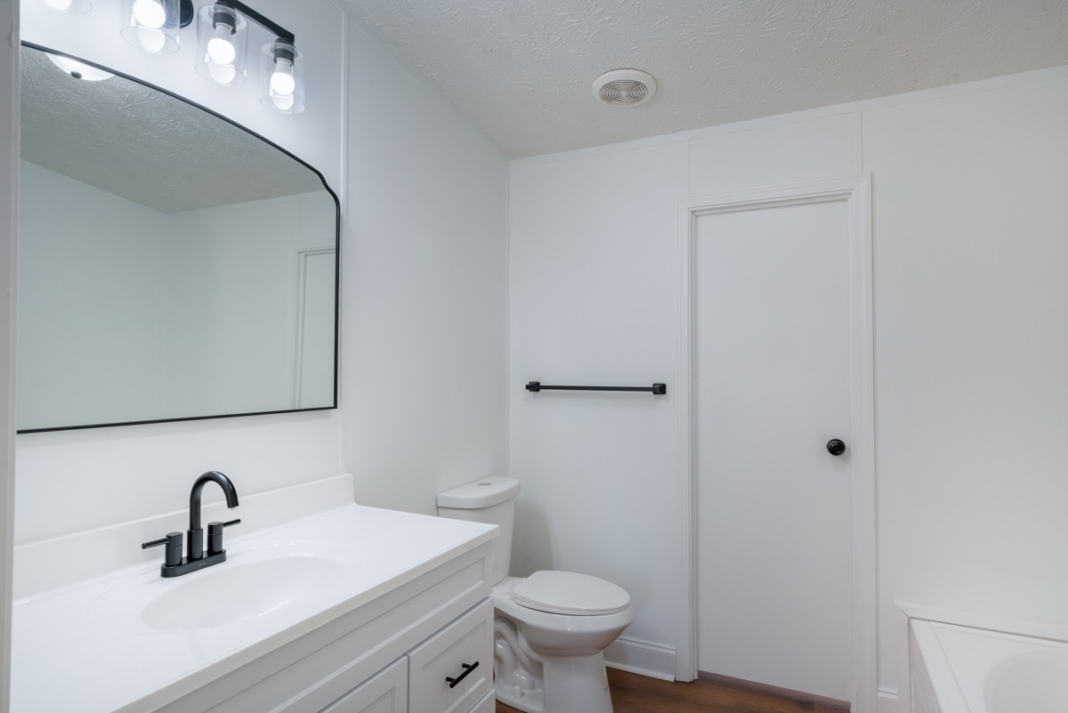 4214 Oregon Road Springfield, TN 37172 - Photo 22 of 37 a bathroom with a sink toilet and a mirror