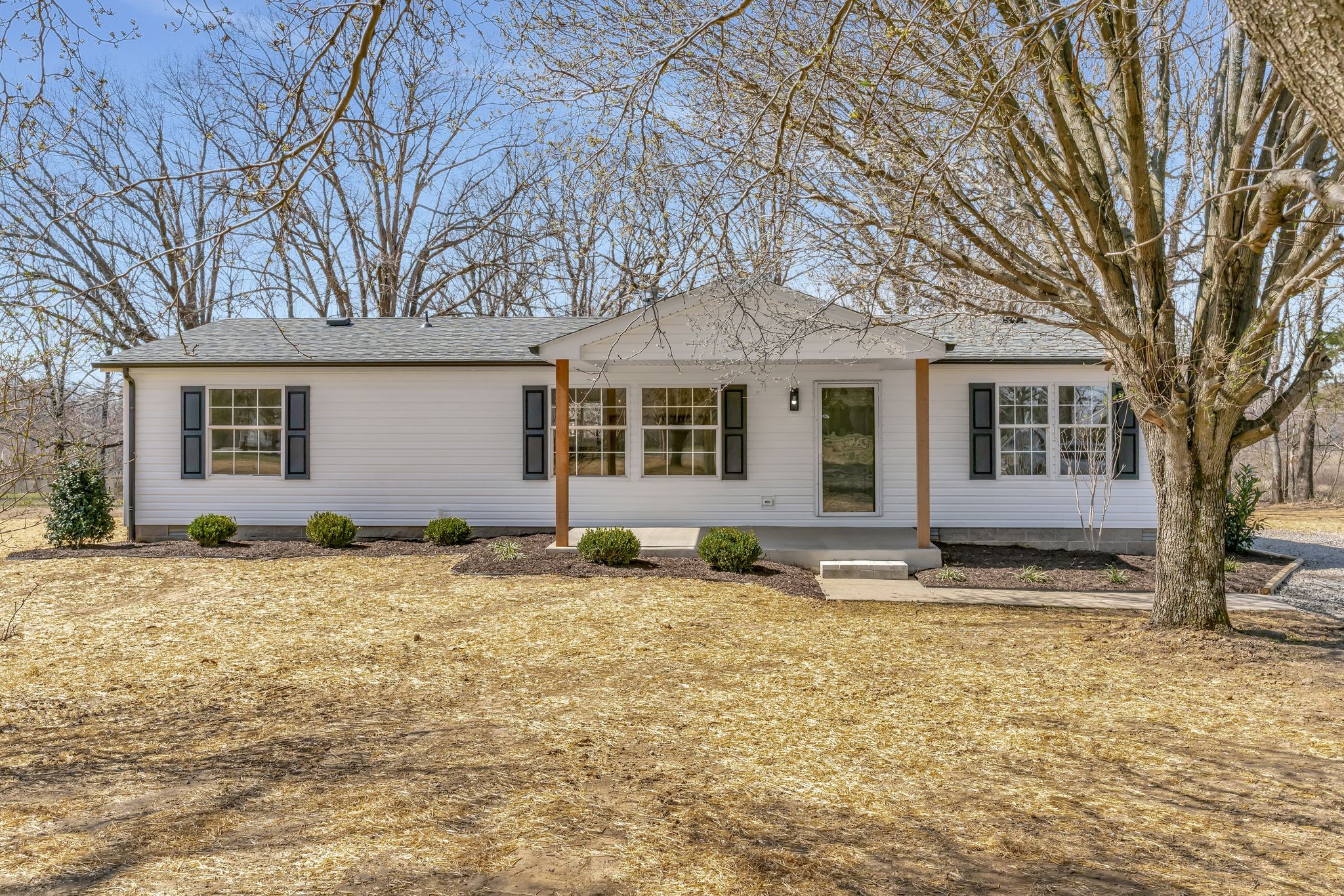 4214 Oregon Road Springfield, TN 37172 - Photo 3 of 37 a backyard of a house with yard and outdoor seating