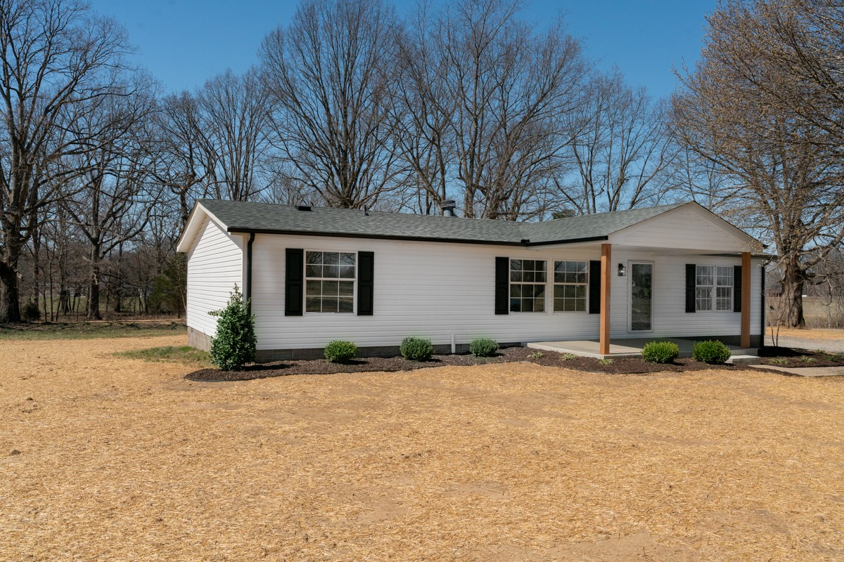 4214 Oregon Road Springfield, TN 37172 - Photo 5 of 37 a front view of a house with a yard