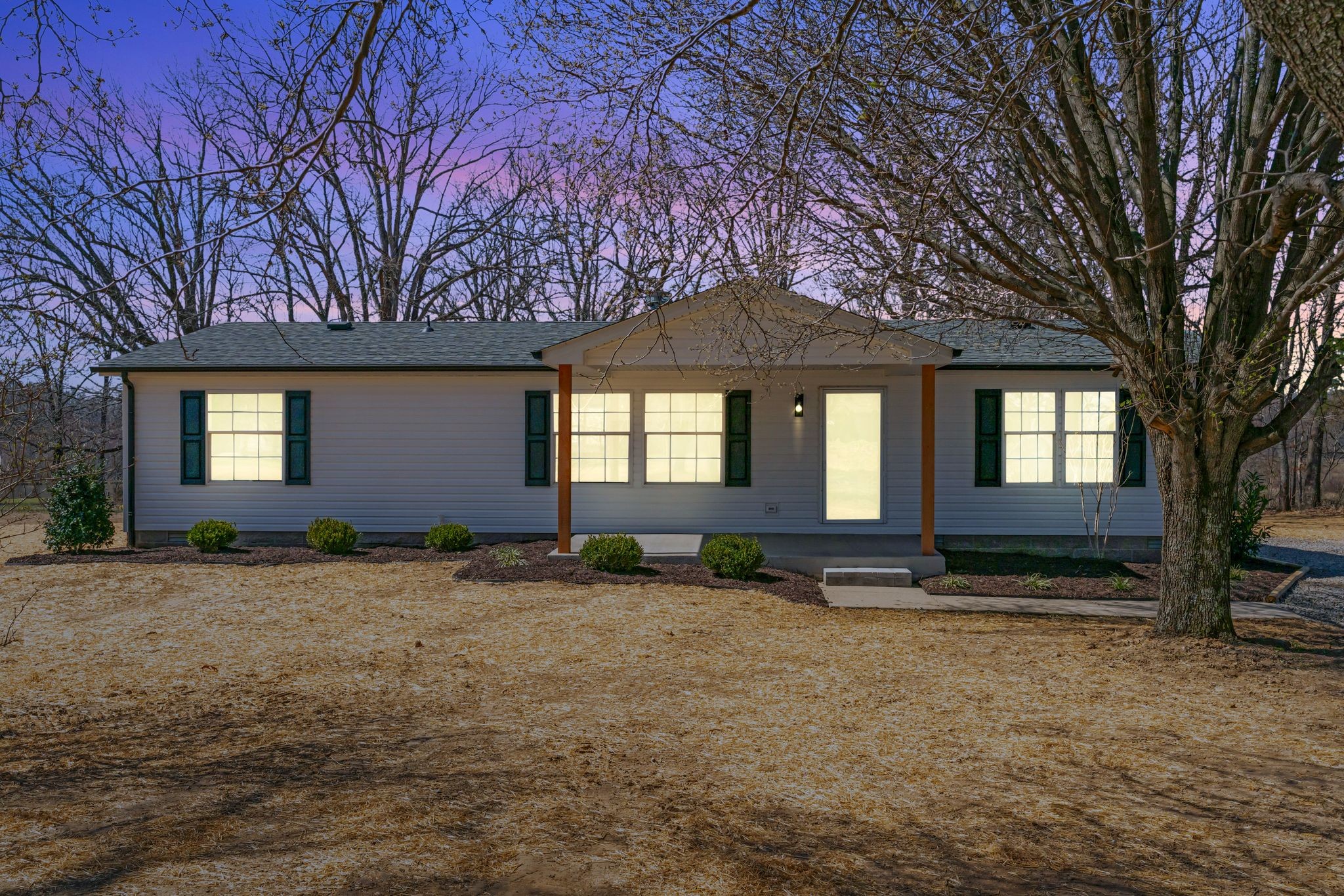 4214 Oregon Road Springfield, TN 37172 - Photo 6 of 37 a backyard of a house with barbeque oven table and chairs