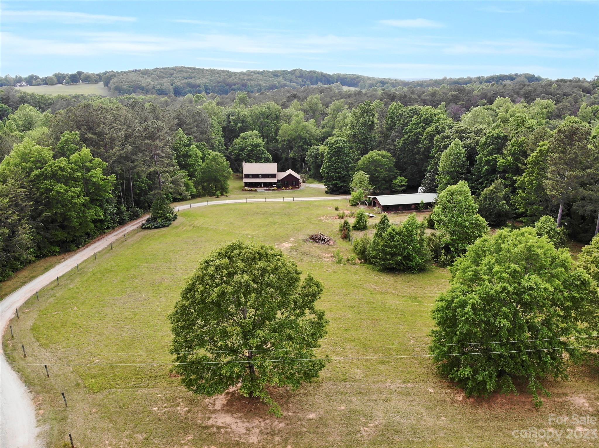 321 David Sims Road Rutherfordton, NC 28139 - Photo 2 of 47 a view of a swimming pool with a yard