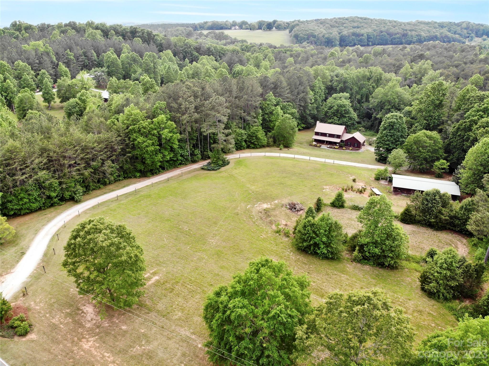 321 David Sims Road Rutherfordton, NC 28139 - Photo 3 of 47 an aerial view of a house with a yard