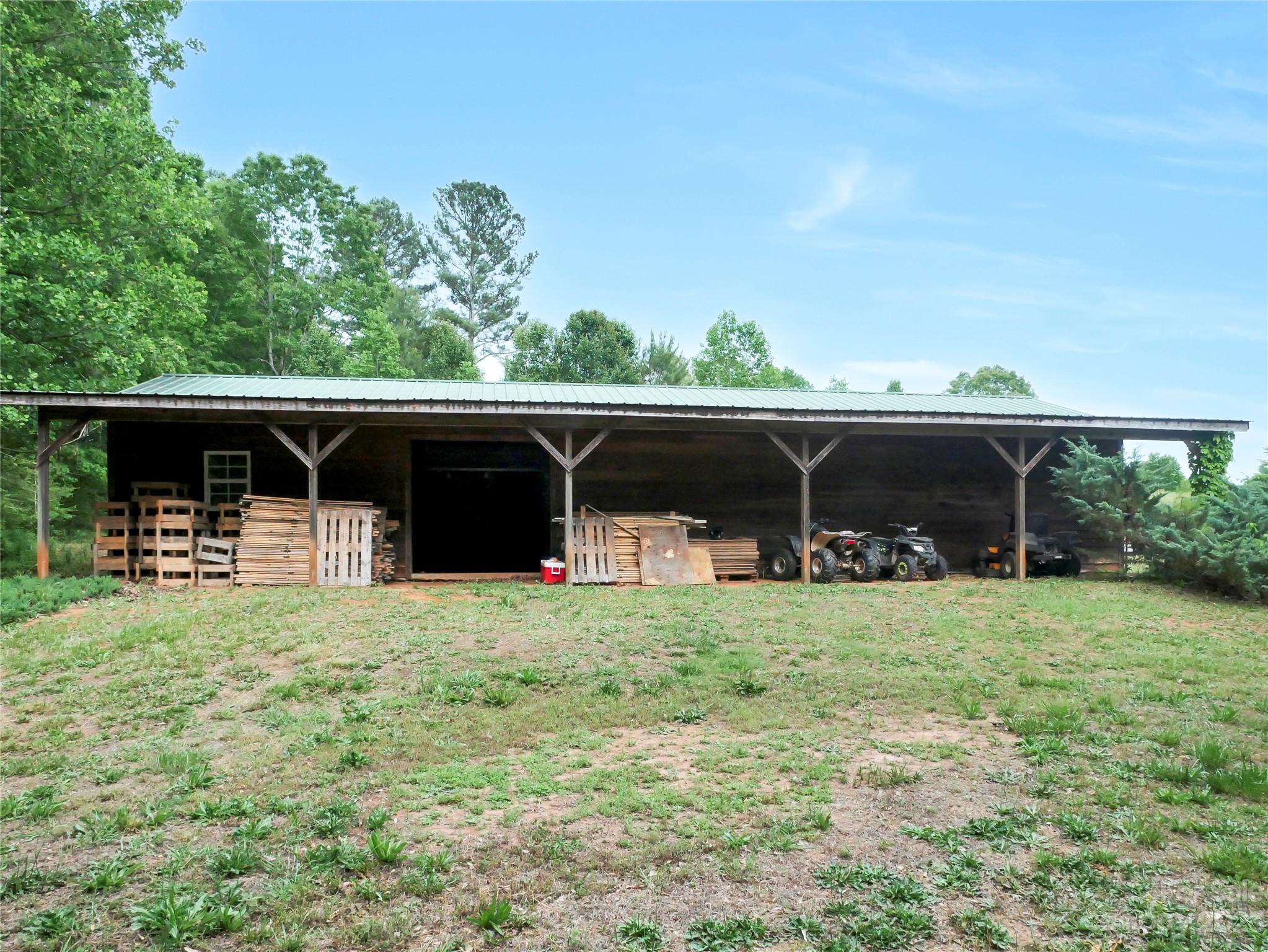 321 David Sims Road Rutherfordton, NC 28139 - Photo 8 of 47 a view of house with yard and outdoor seating