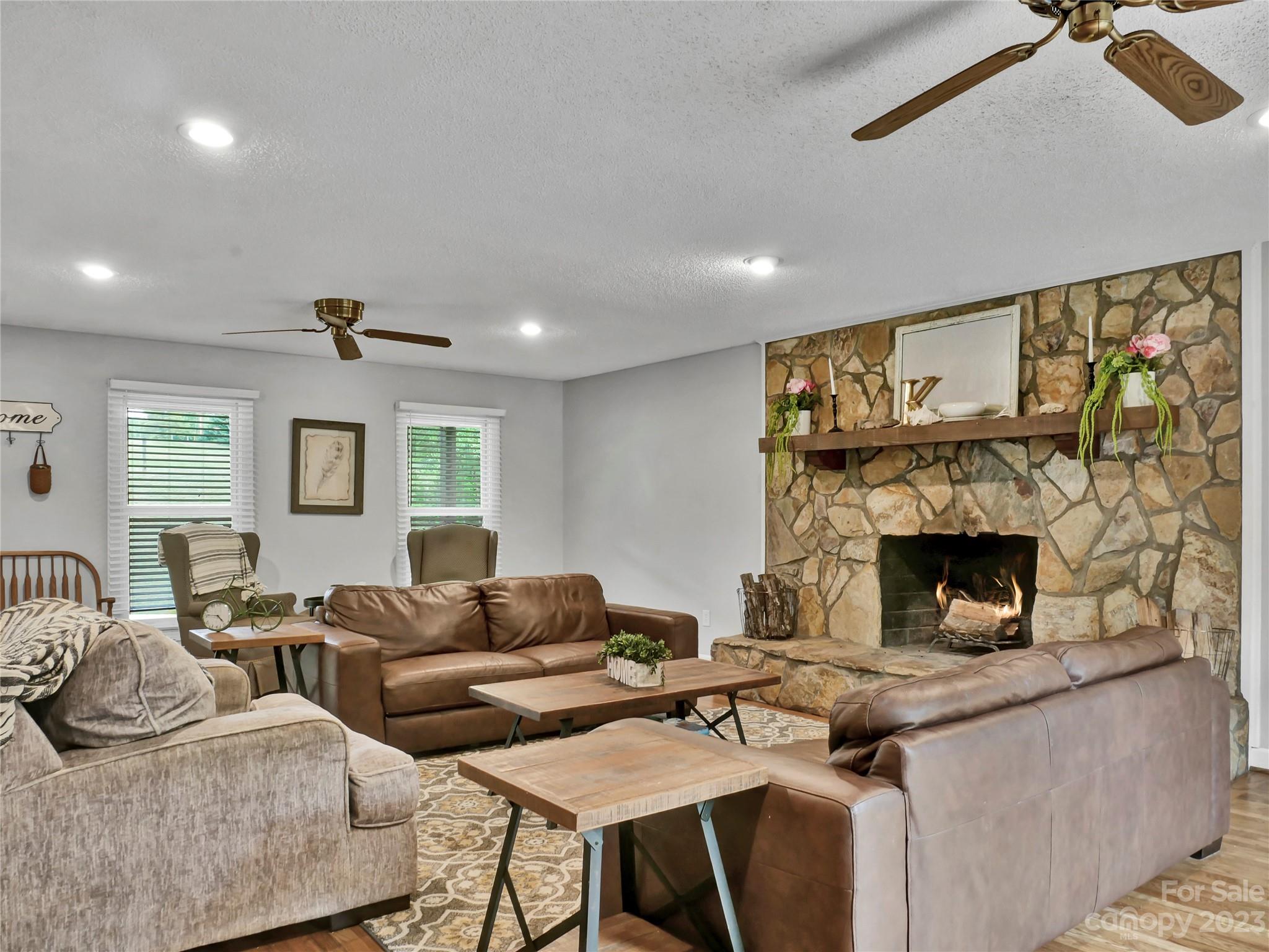 321 David Sims Road Rutherfordton, NC 28139 - Photo 9 of 47 a living room with furniture and a fireplace