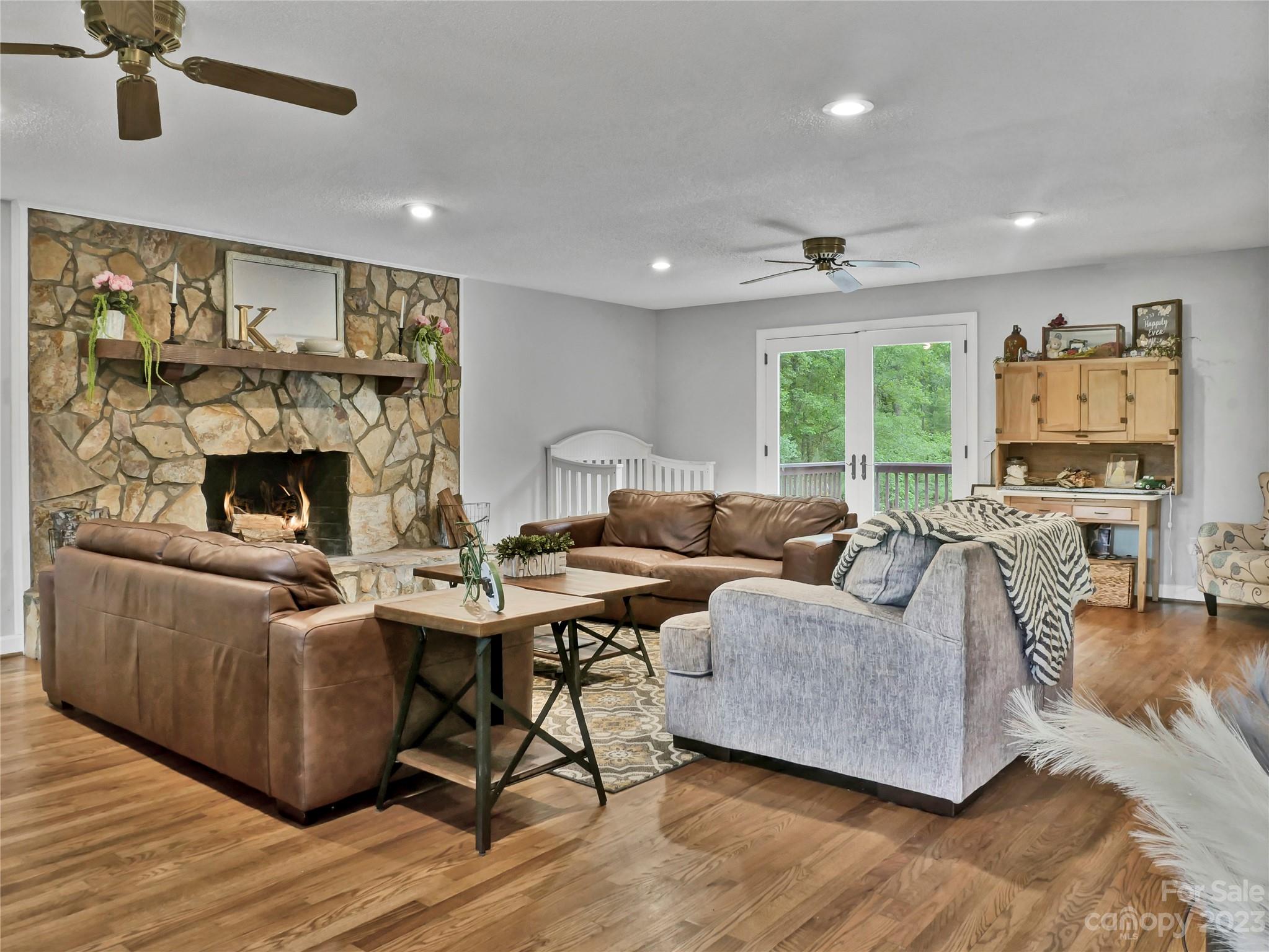 321 David Sims Road Rutherfordton, NC 28139 - Photo 10 of 47 a living room with furniture and a fireplace