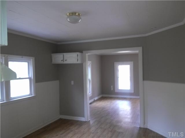 351 Holt Road Graham, NC 27253 - Photo 5 of 14 Another view of the kitchen with living room (front of house) adjacent....
