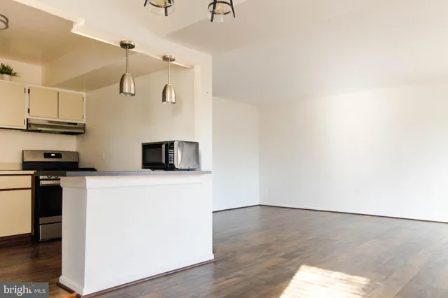a view of cabinets with washer and dryer