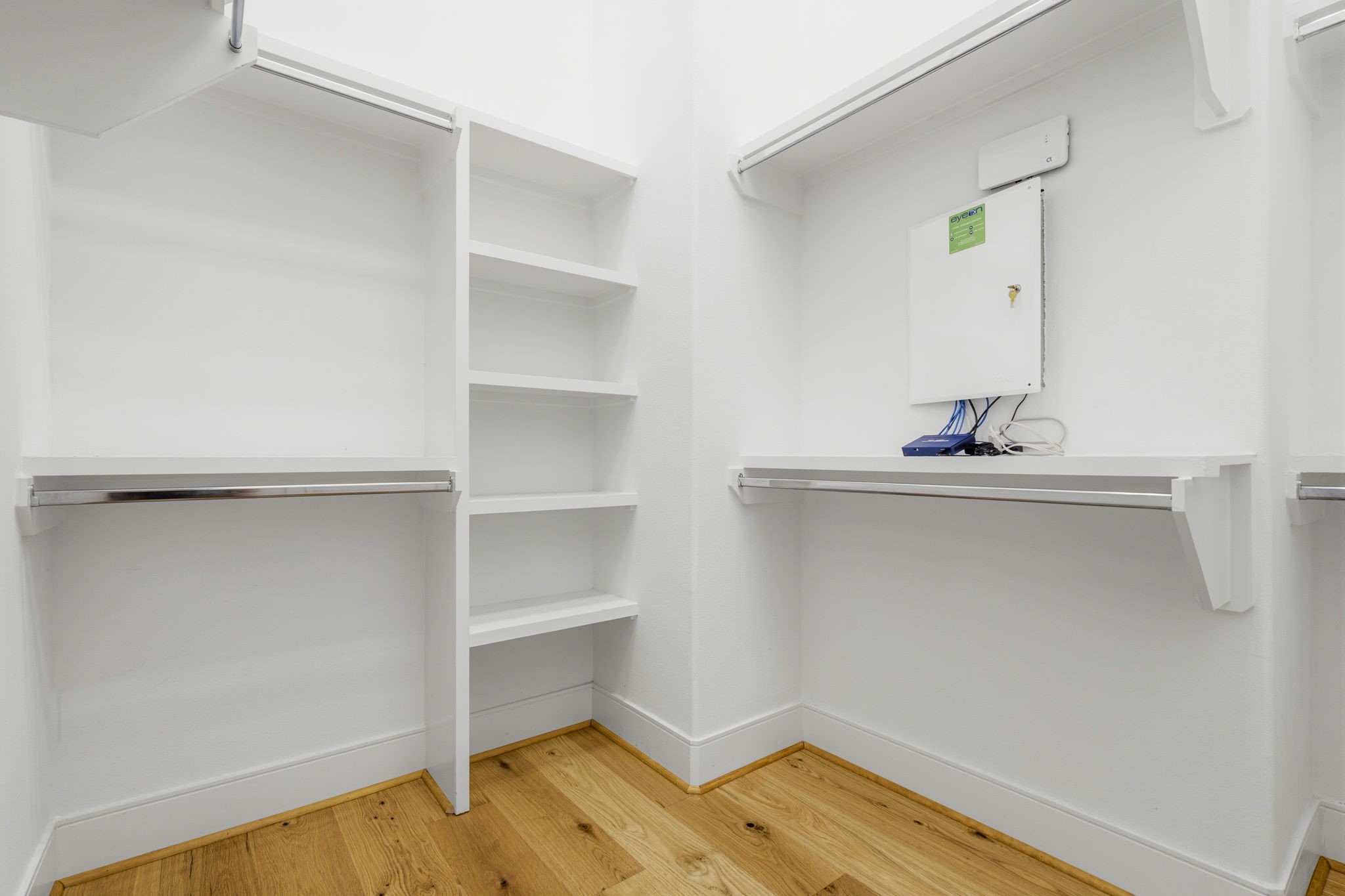 2624 Rusk Street Houston, TX 77003 - Photo 26 of 30 Expansive primary closet with abundant shelving and hanging space, perfect for all your wardrobe needs.