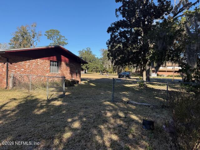 8002 Lenox Avenue Jacksonville, FL 32221 - Photo 5 of 20 a view of a yard with an outdoor space