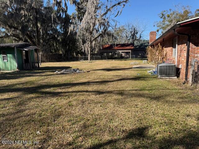 8002 Lenox Avenue Jacksonville, FL 32221 - Photo 7 of 20 a view of swimming pool with outdoor seating and covered with trees