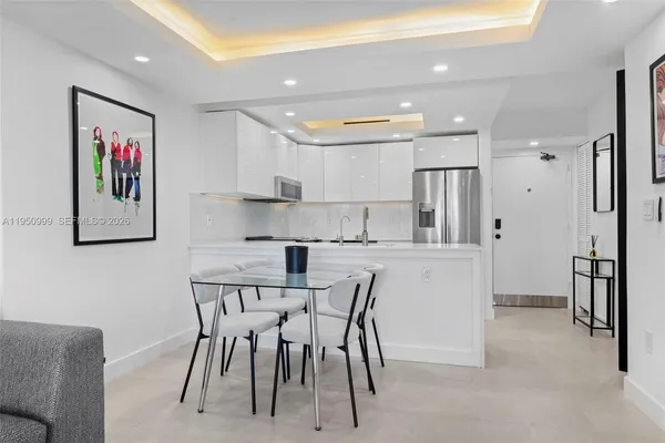 a view of a dining room with furniture