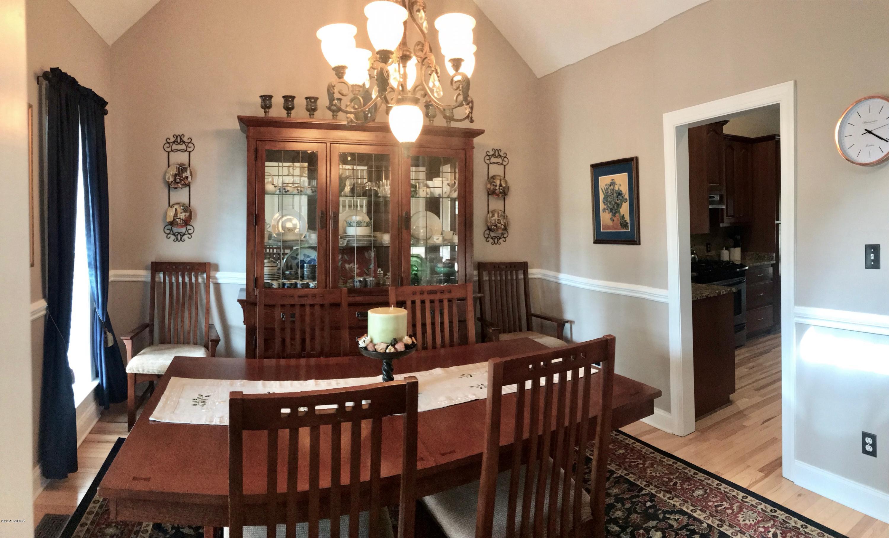 351 Eagle Ridge Road Macon, GA 31216 - Photo 7 of 33 a view of a dining room with furniture window and wooden floor