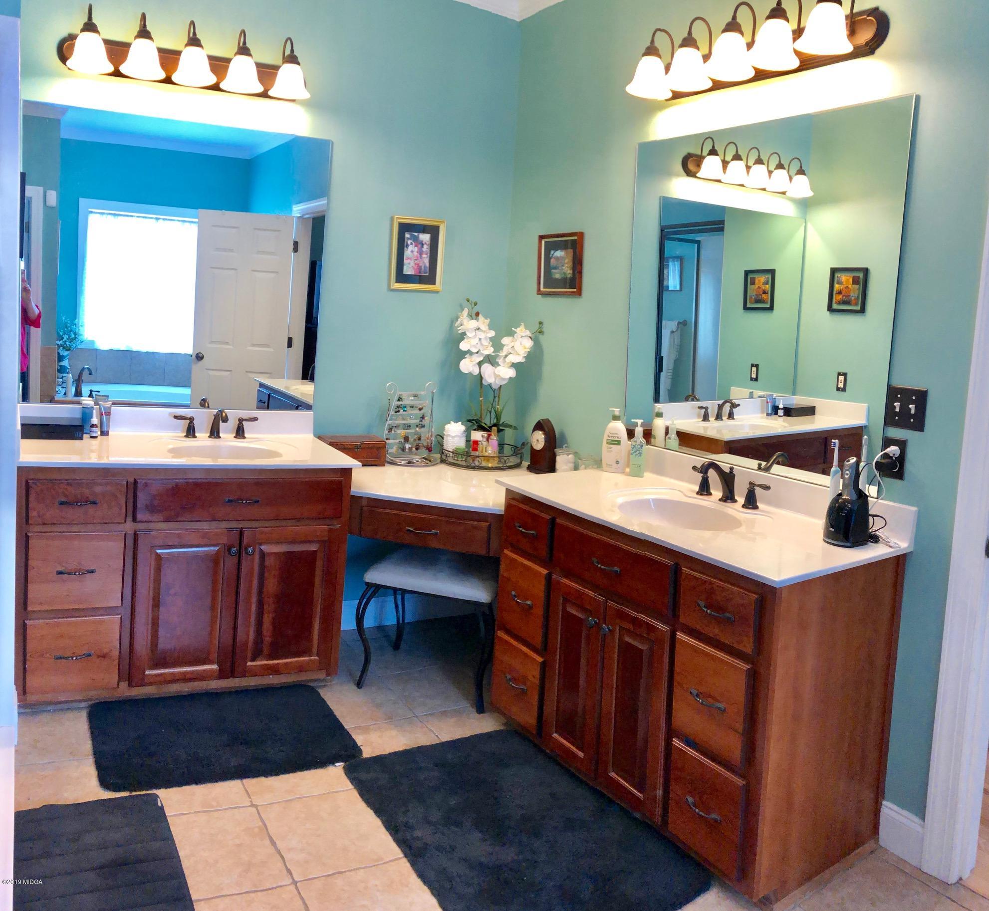 351 Eagle Ridge Road Macon, GA 31216 - Photo 10 of 33 a room with a sink cabinets and window