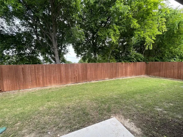a view of outdoor space with deck and backyard