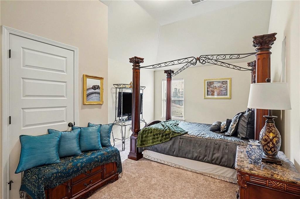 90 Waters Edge Lane Covington, GA 30014 - Photo 15 of 18 a living room with furniture and a lamp