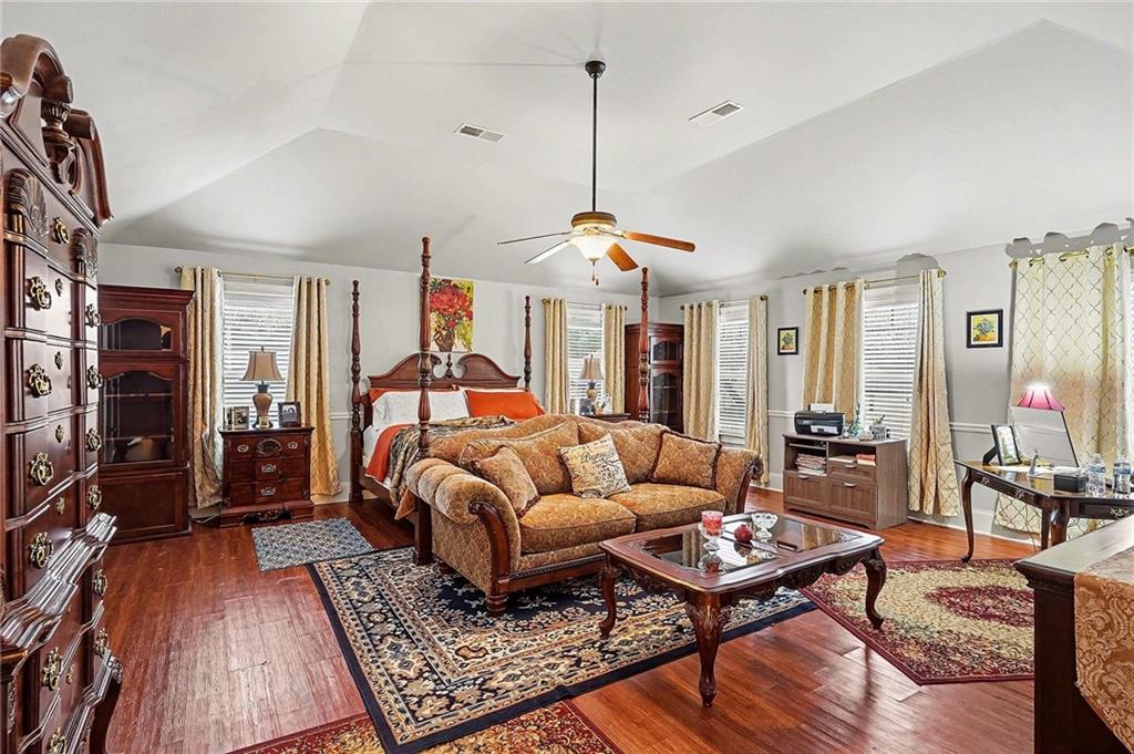 90 Waters Edge Lane Covington, GA 30014 - Photo 10 of 18 a bed room with furniture and a rug