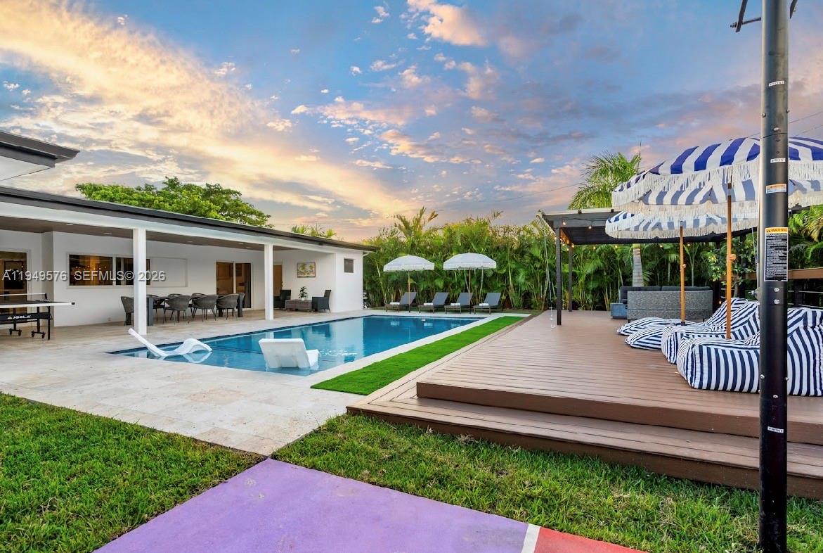 5111 Adams Street Hollywood, FL 33021 - Photo 18 of 66 a view of a house with backyard and sitting area