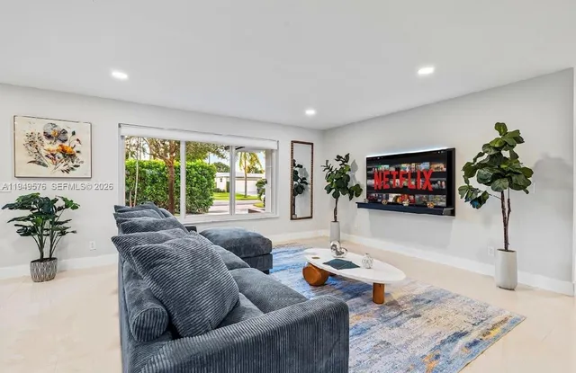 a kitchen with a dining table chairs and view kitchen