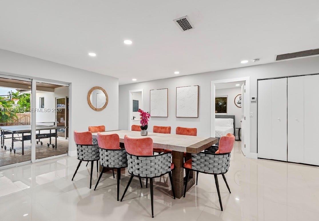 5111 Adams Street Hollywood, FL 33021 - Photo 29 of 66 a view of a dining room with furniture and window
