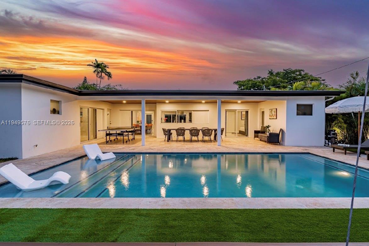 5111 Adams Street Hollywood, FL 33021 - Photo 4 of 66 a view of swimming pool with a yard