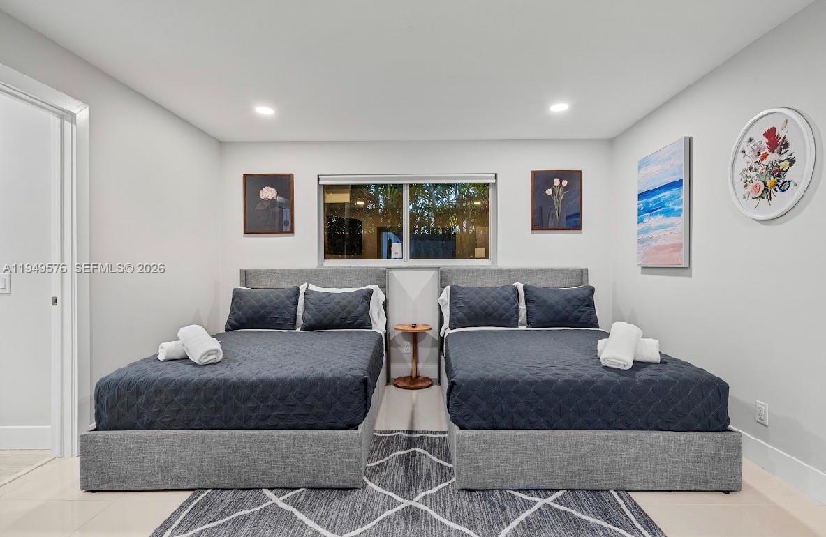 5111 Adams Street Hollywood, FL 33021 - Photo 46 of 66 a living room with furniture and a large window