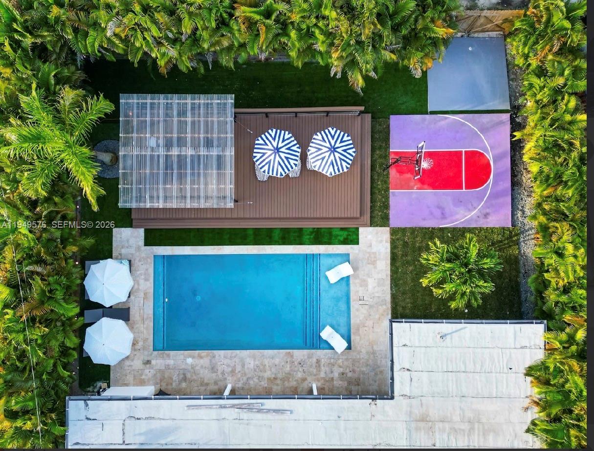 5111 Adams Street Hollywood, FL 33021 - Photo 52 of 66 a sign that is on the side of a building