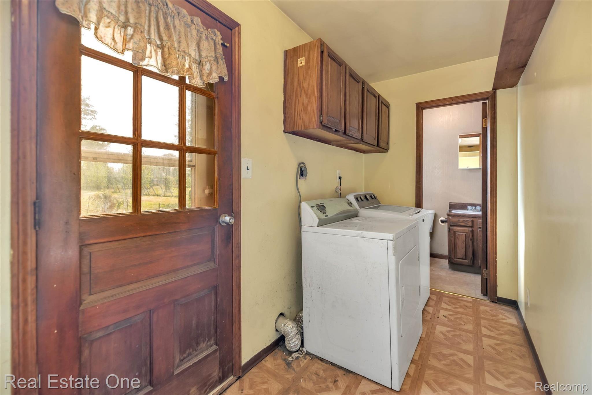 5400 North Fleming Road Fowlerville, MI 48836 - Photo 16 of 40 21-5400 Fleming Rd-WindowStill-Real.jpg