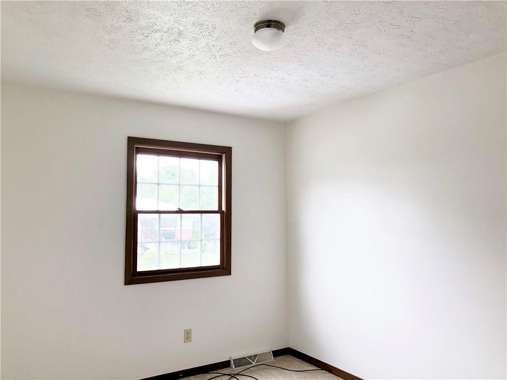 209 Donnell Road Lower Burrell, PA 15068 - Photo 14 of 22 3rd bedroom with new carpet.