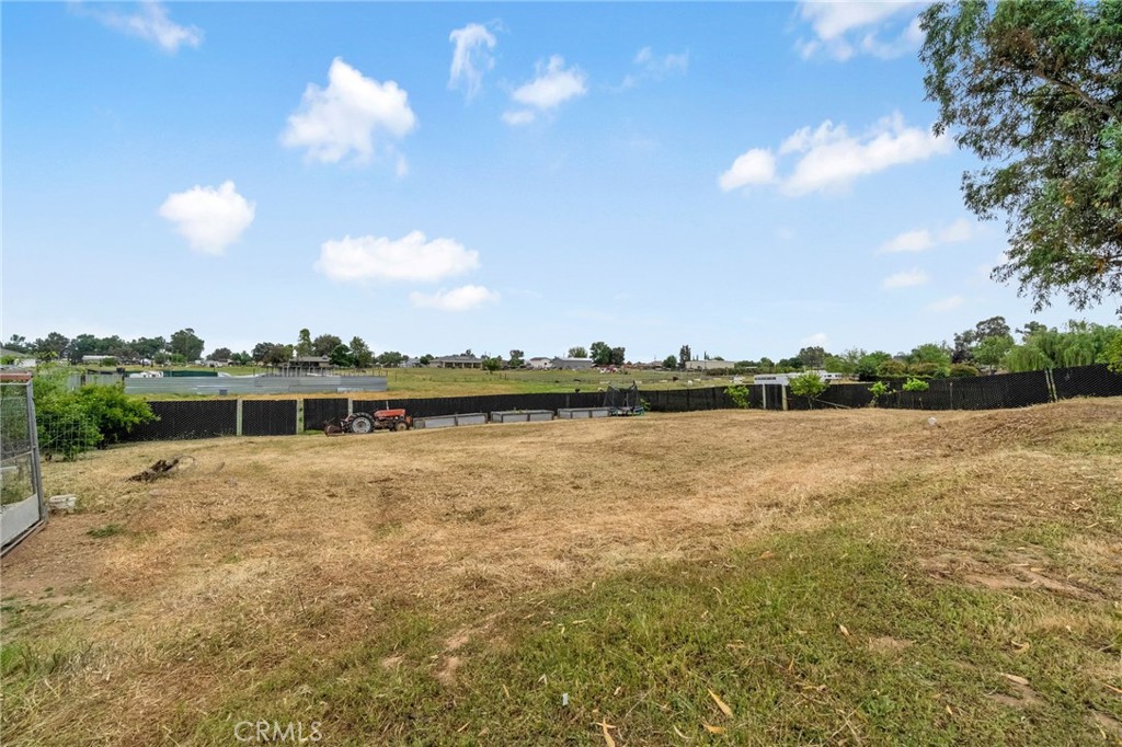 19729 Brightwood Road Madera, CA 93638 - Photo 30 of 33 a view of a lake with houses in the back