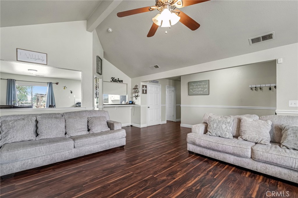19729 Brightwood Road Madera, CA 93638 - Photo 8 of 33 a living room with furniture and a wooden floor