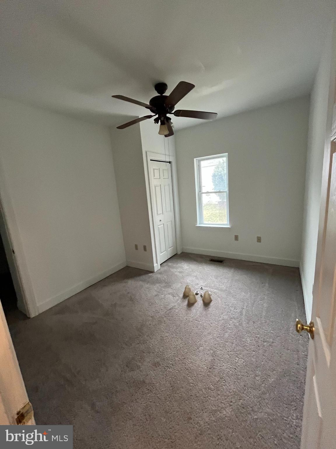 5 Ehst Road Bechtelsville, PA 19505 - Photo 15 of 23 an empty room with windows and fan