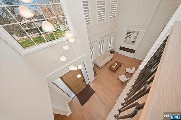 a view of living room with furniture and a flat screen tv