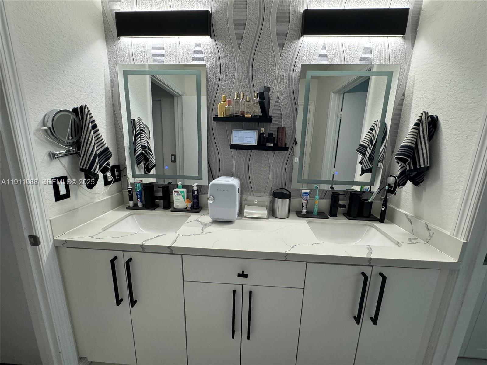 167 Southwest 6th Lane Florida City, FL 33034 - Photo 11 of 19 a bathroom with a sink vanity and mirror