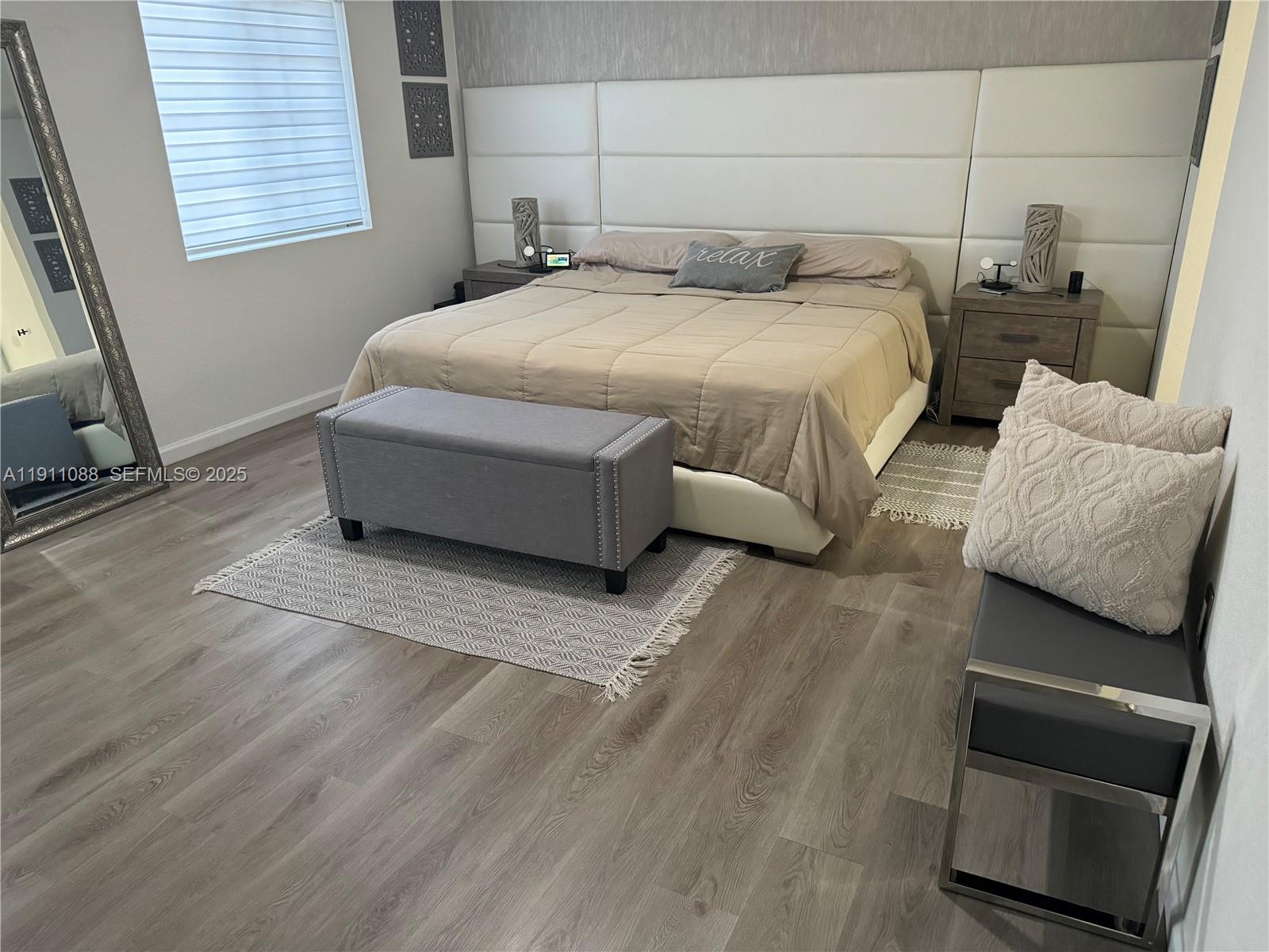 167 Southwest 6th Lane Florida City, FL 33034 - Photo 15 of 19 a bedroom with a bed and a couch