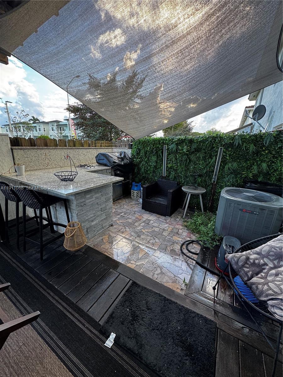 167 Southwest 6th Lane Florida City, FL 33034 - Photo 17 of 19 a view of a backyard with sitting area