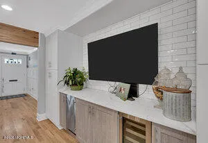 a room with furniture and a potted plant