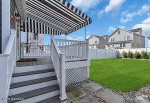a view of a back yard of a house