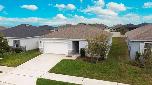 a house view with a garden space