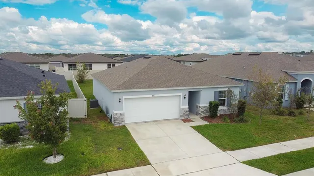 front view of house with a yard