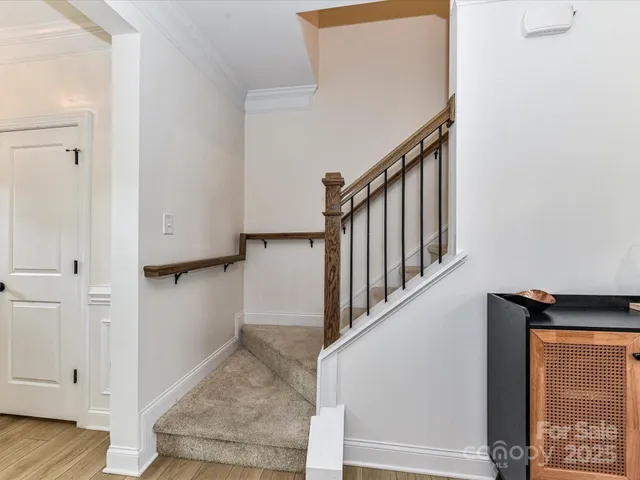 a view of entryway with wooden floor