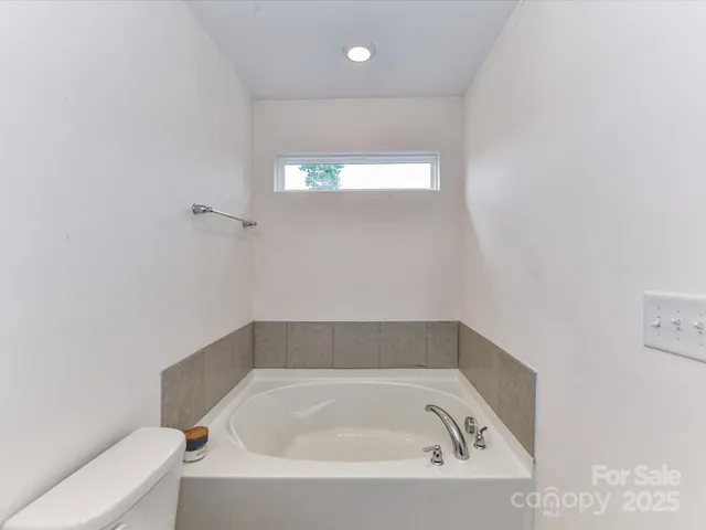 a bathroom with a tub