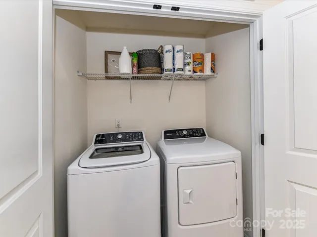 a utility room with dryer and washer
