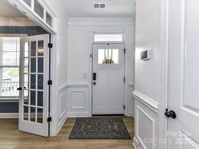 a view of a utility room with a sink