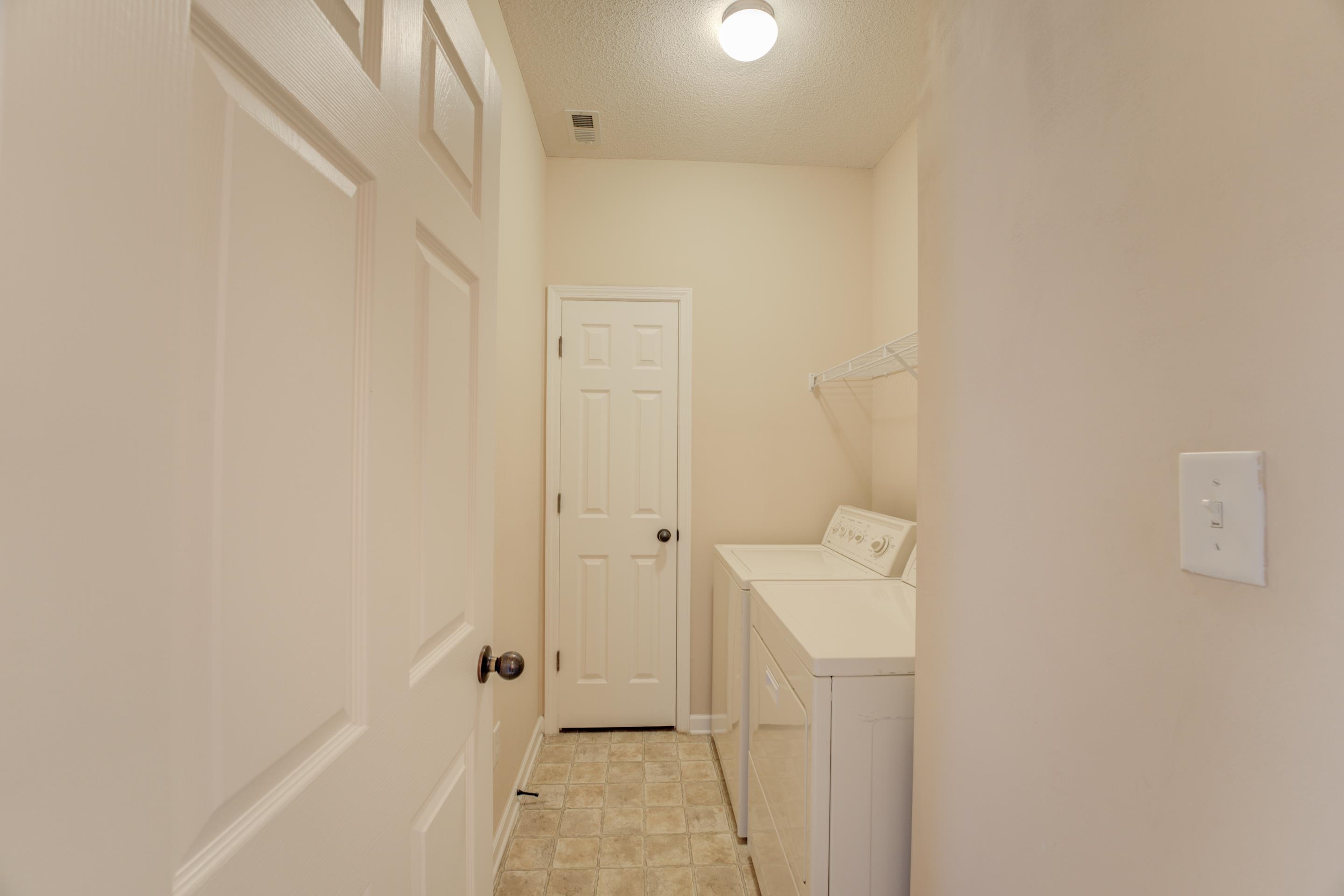 7243 Grapetree Trail Cordova, TN 38018 - Photo 13 of 20 a bathroom with a sink a toilet and shower