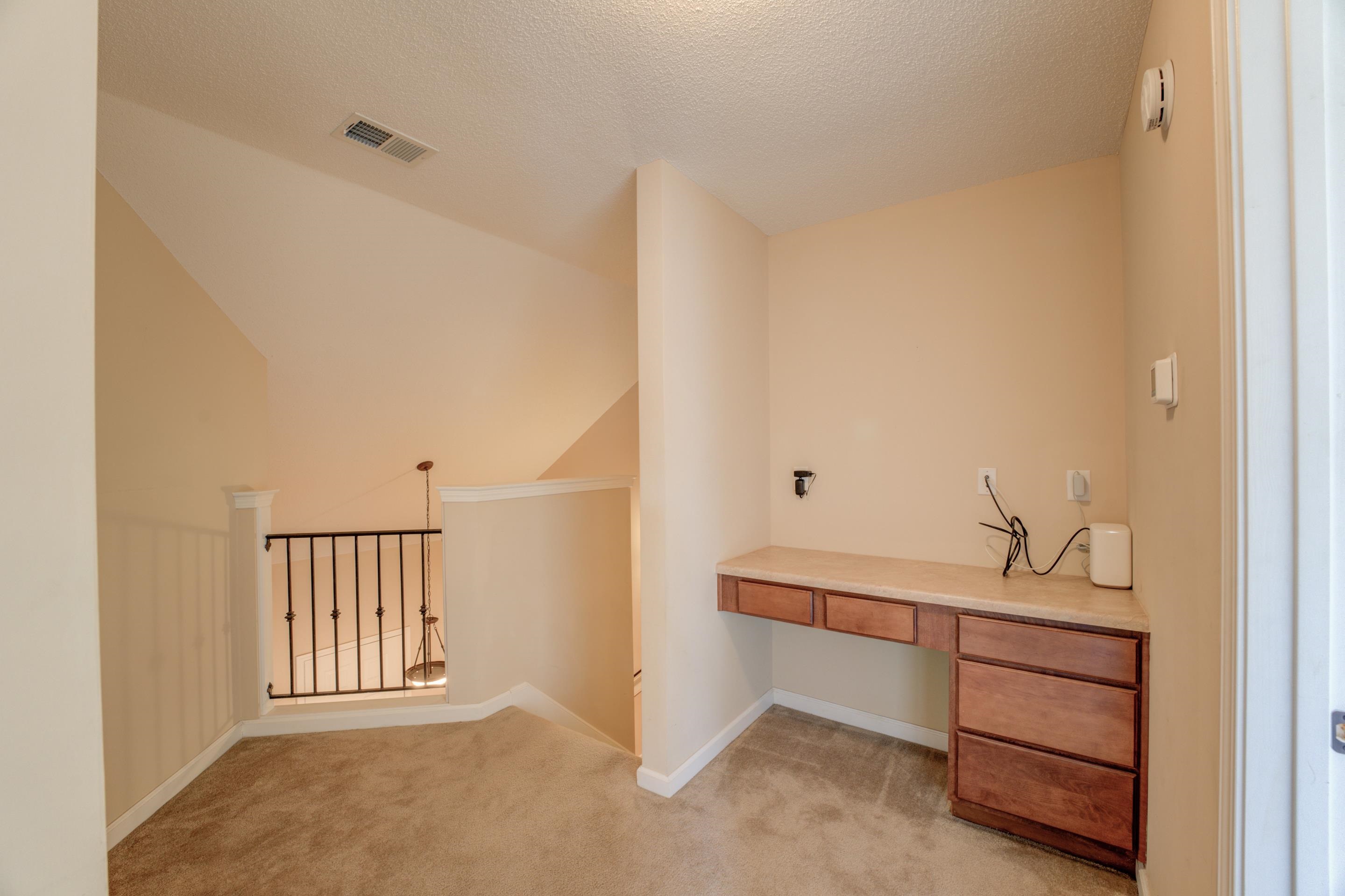 7243 Grapetree Trail Cordova, TN 38018 - Photo 15 of 20 a bedroom with a bed and cabinets