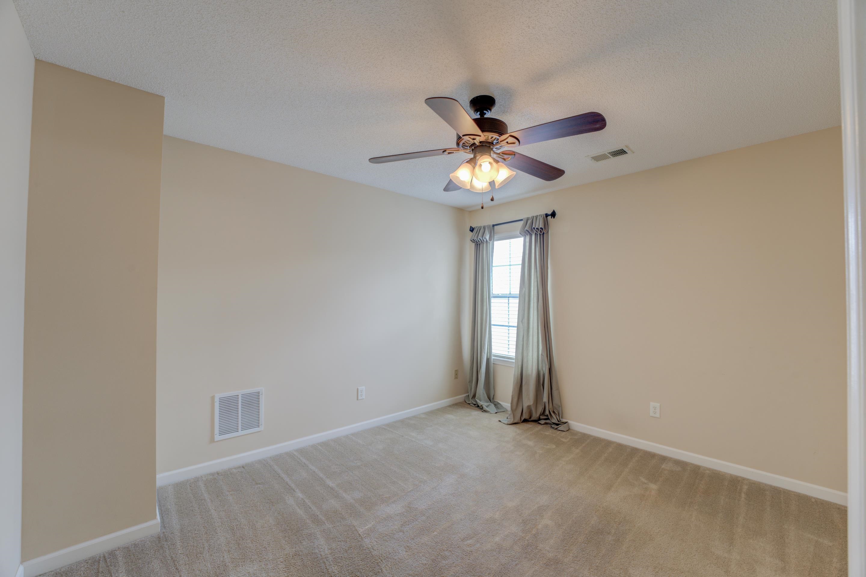 7243 Grapetree Trail Cordova, TN 38018 - Photo 17 of 20 a view of an empty room with a window