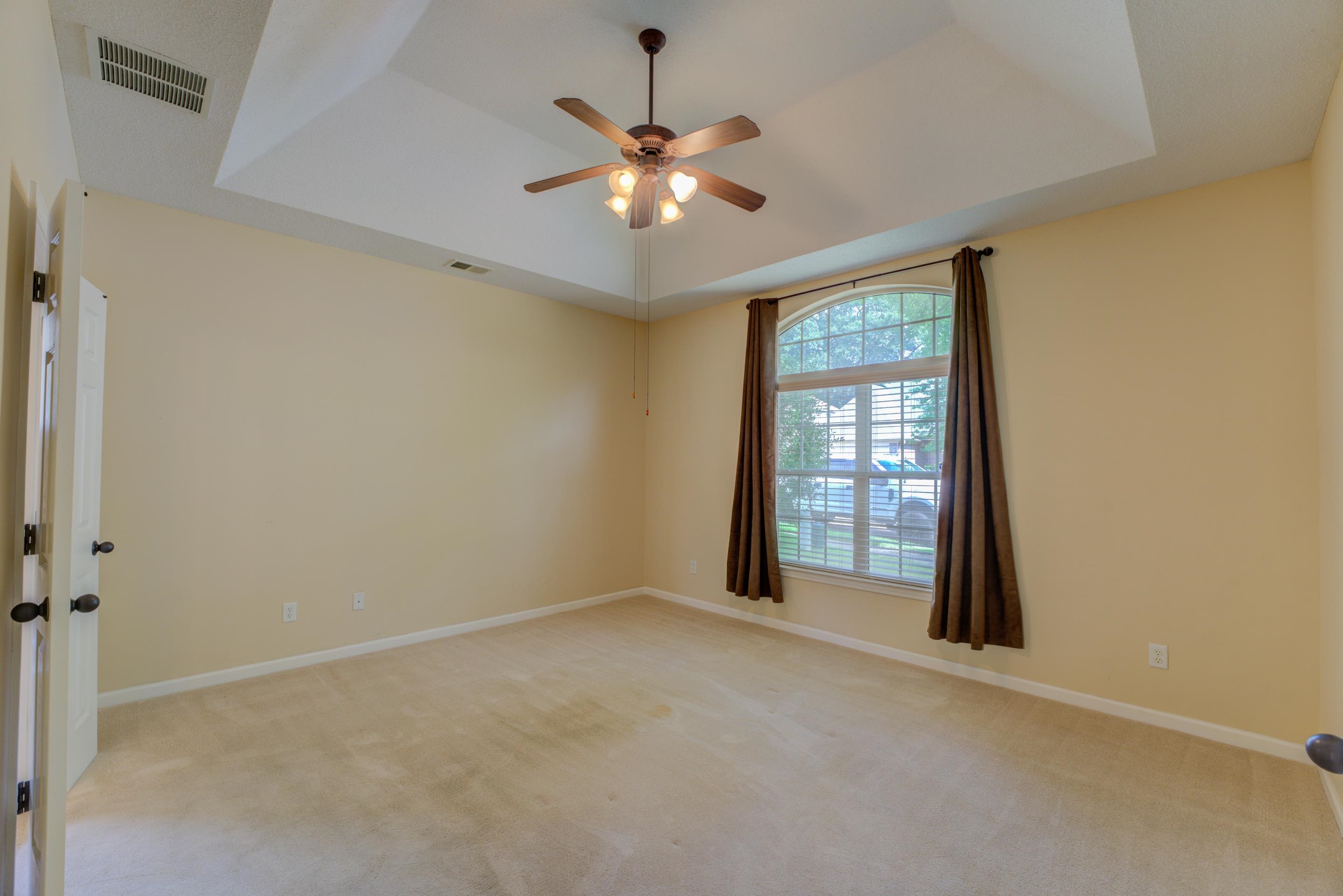 7243 Grapetree Trail Cordova, TN 38018 - Photo 4 of 20 a view of an empty room with a window