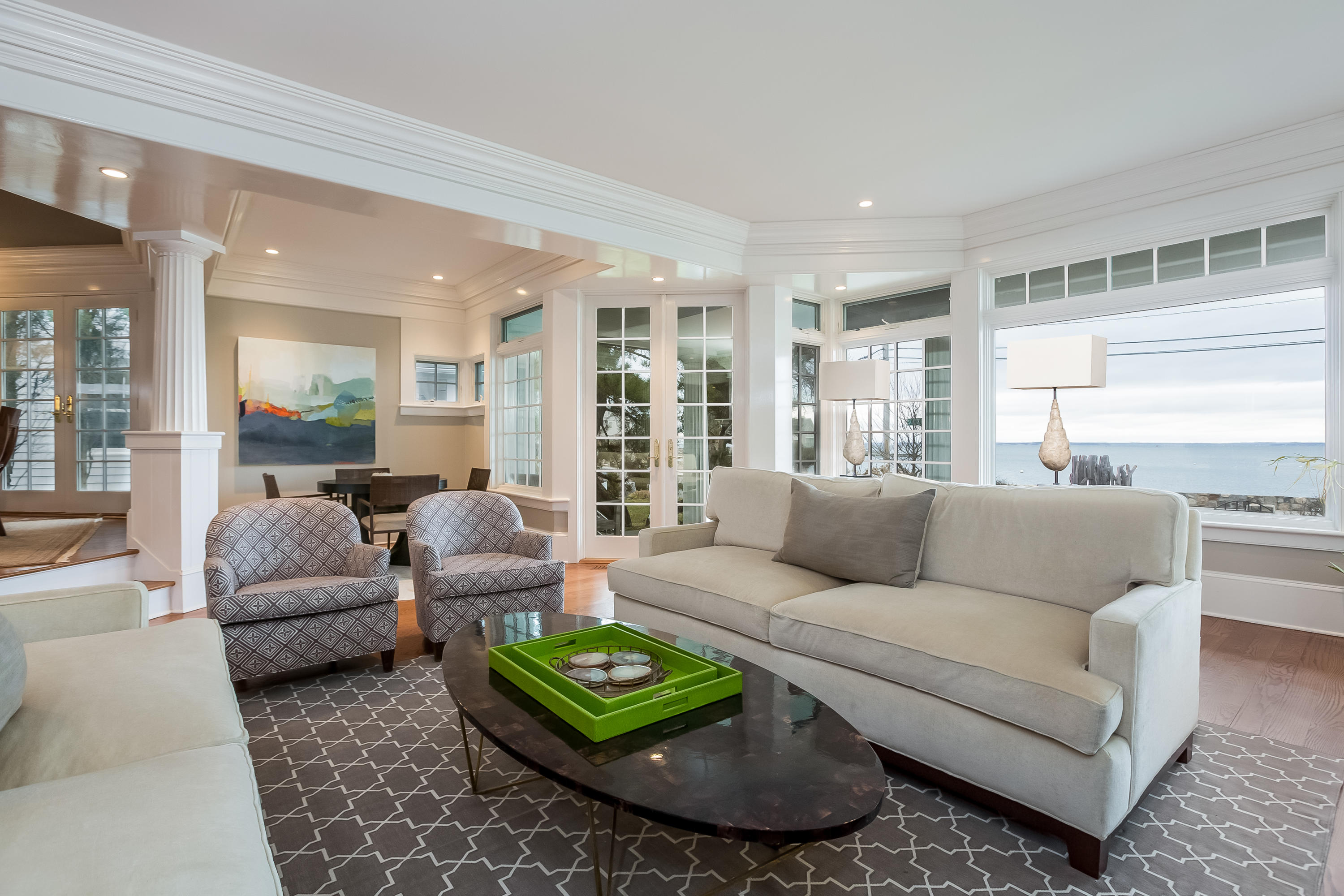 13 Crescent Beach Road Rowayton, CT 06853 - Photo 11 of 40 a living room with furniture and a large window