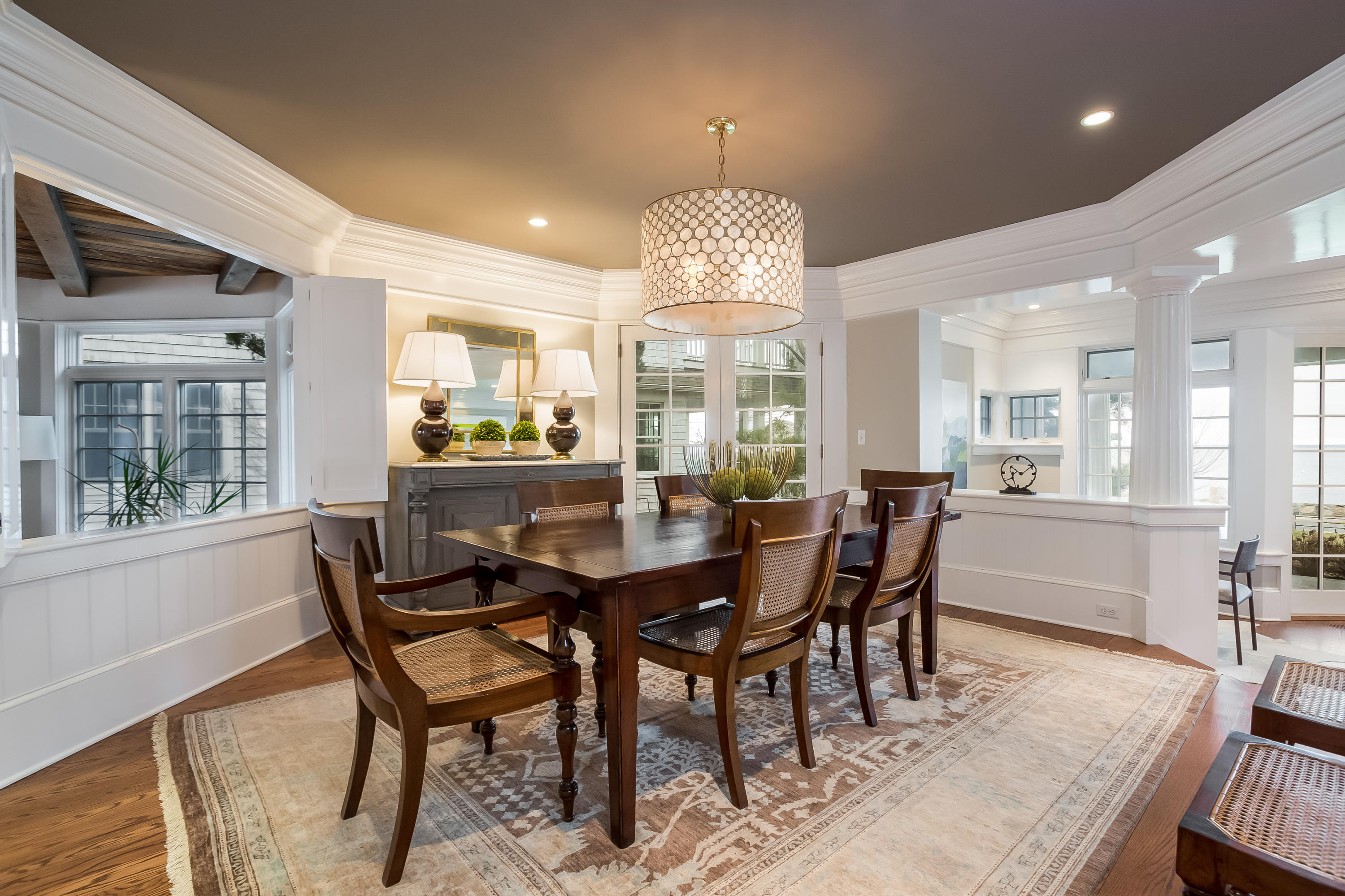 13 Crescent Beach Road Rowayton, CT 06853 - Photo 12 of 40 a view of a dining room with furniture window and wooden floor