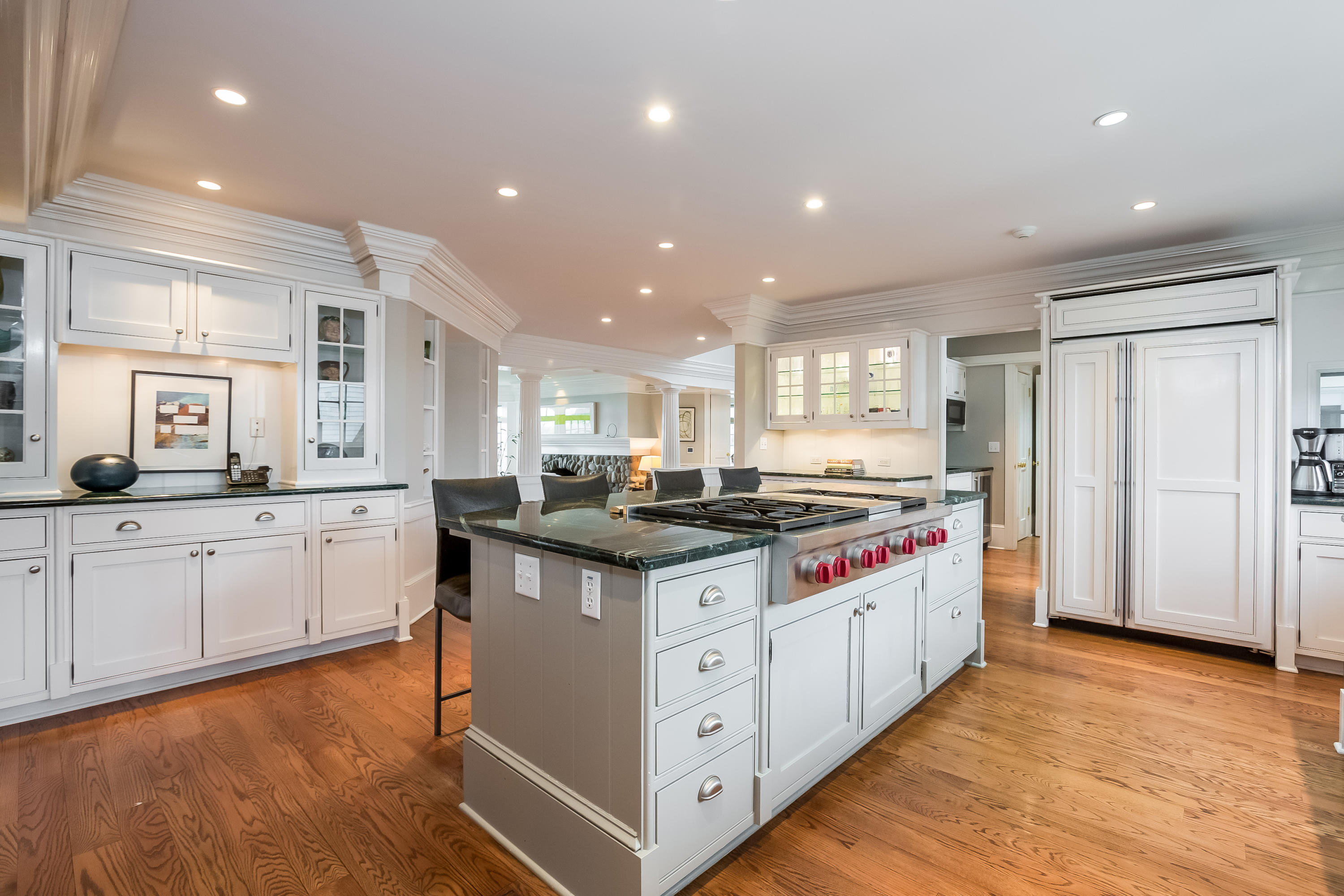 13 Crescent Beach Road Rowayton, CT 06853 - Photo 14 of 40 a kitchen with stainless steel appliances granite countertop a stove and a large refrigerator